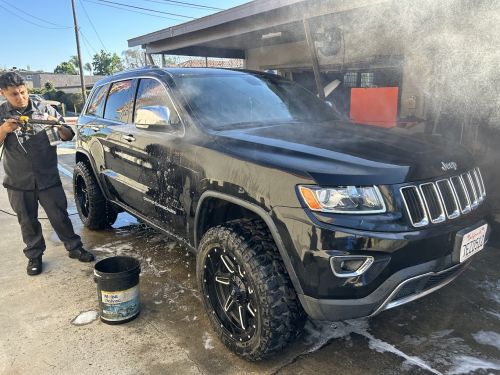 L&C team detailing a Jeep after service